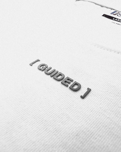 "Guided" Manifesto Off-White Statement Tee